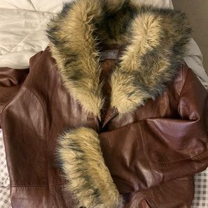 Brown leather coat.